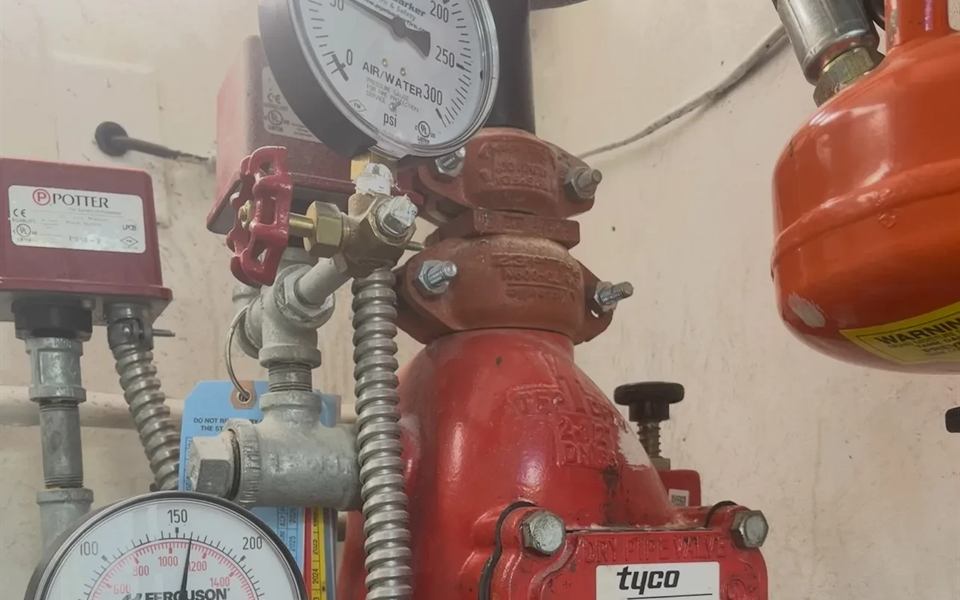 Sprinkler system air and water pressure gauge on a riser